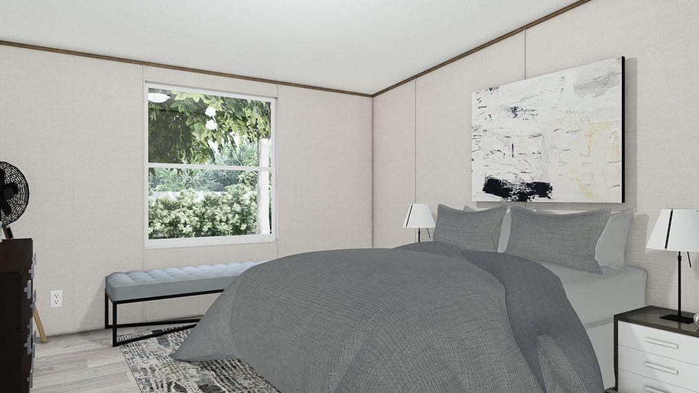 The TRIUMPH Guest Bedroom. This Manufactured Mobile Home features 5 bedrooms and 3 baths.