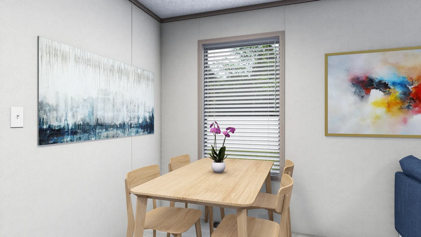 The 6614-4701 THE PULSE Dining Area. This Manufactured Mobile Home features 3 bedrooms and 2 baths.