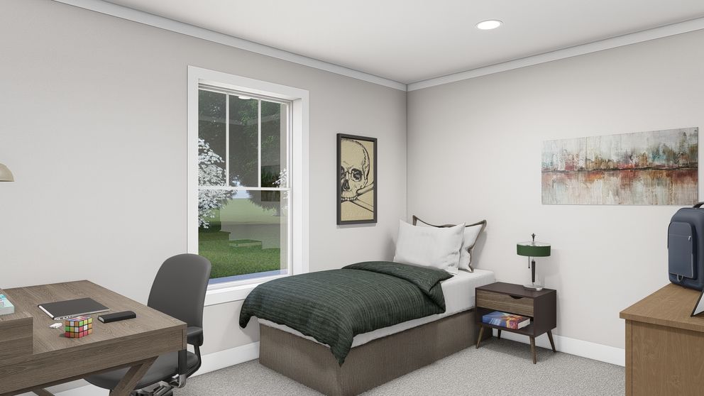 The LET IT BE Bedroom. This Manufactured Mobile Home features 3 bedrooms and 2 baths.