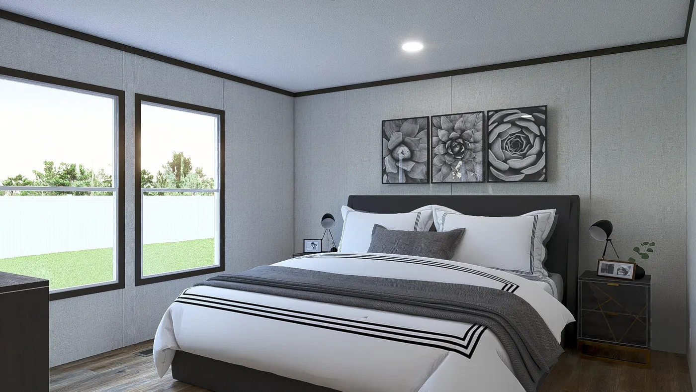 The IMPACT Primary Bedroom. This Manufactured Mobile Home features 4 bedrooms and 2 baths.