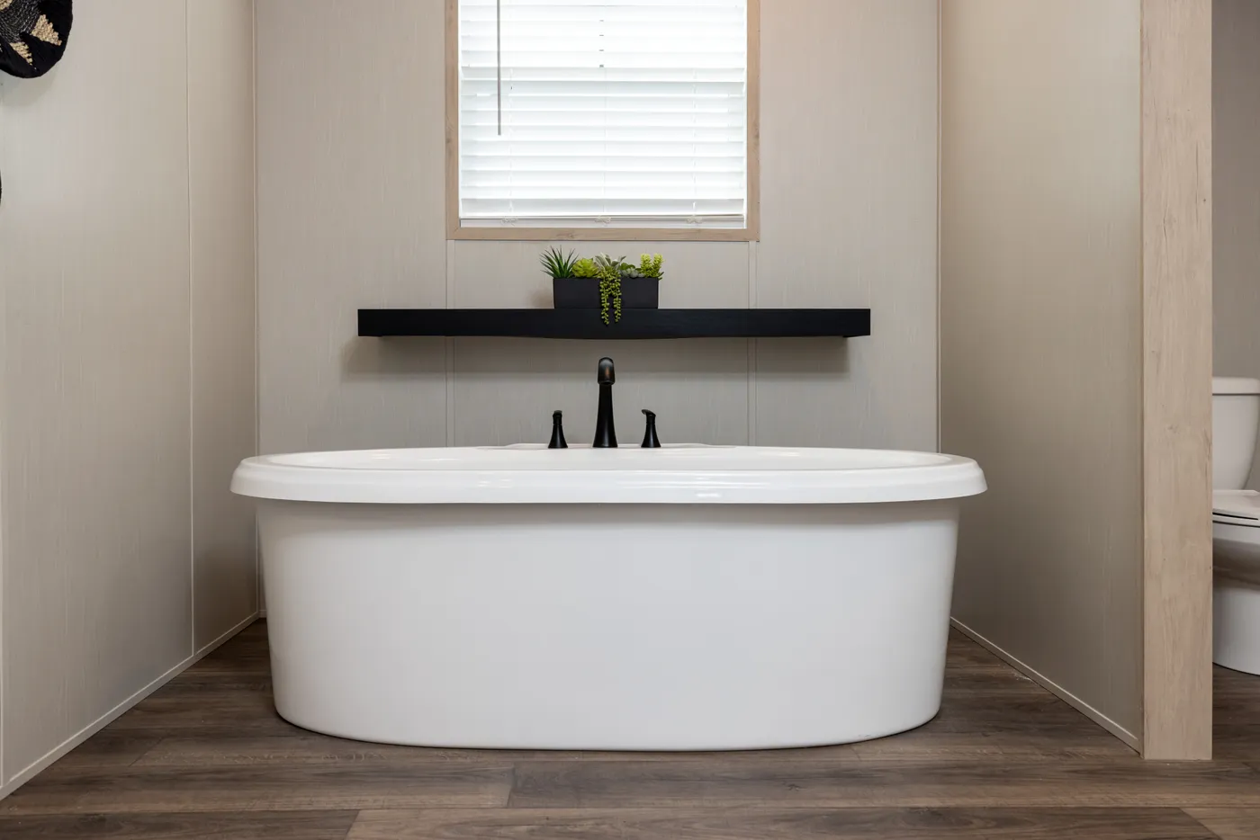 The VISION Primary Bathroom. This Manufactured Mobile Home features 4 bedrooms and 2 baths.