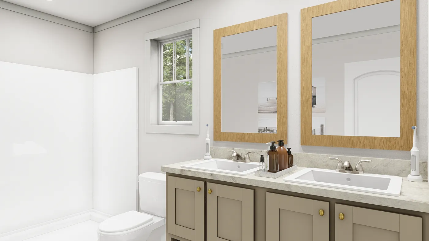The WHOLE LOTTA LOVE Primary Bathroom. This Manufactured Mobile Home features 3 bedrooms and 2 baths.