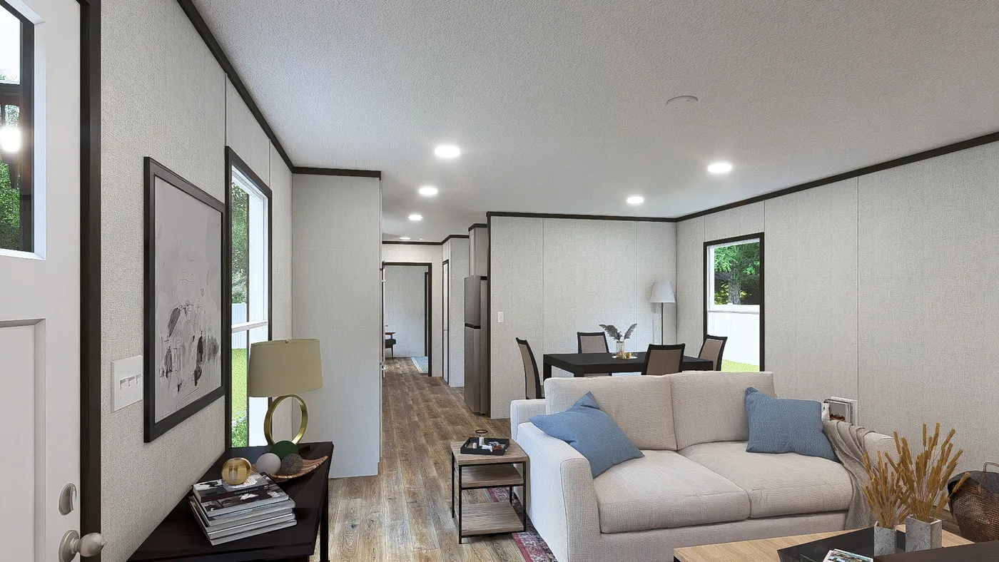 The DESIRE Living Room. This Manufactured Mobile Home features 3 bedrooms and 2 baths.