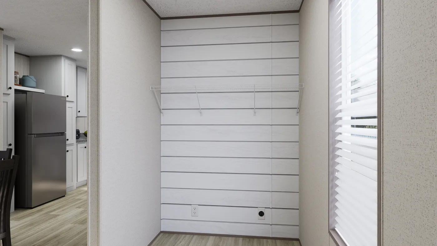 The ROCKY VALLEY Utility Room. This Manufactured Mobile Home features 3 bedrooms and 2 baths.