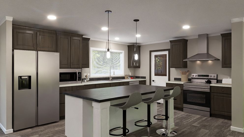 The THE LIL' EASY Kitchen. This Manufactured Mobile Home features 3 bedrooms and 2 baths.