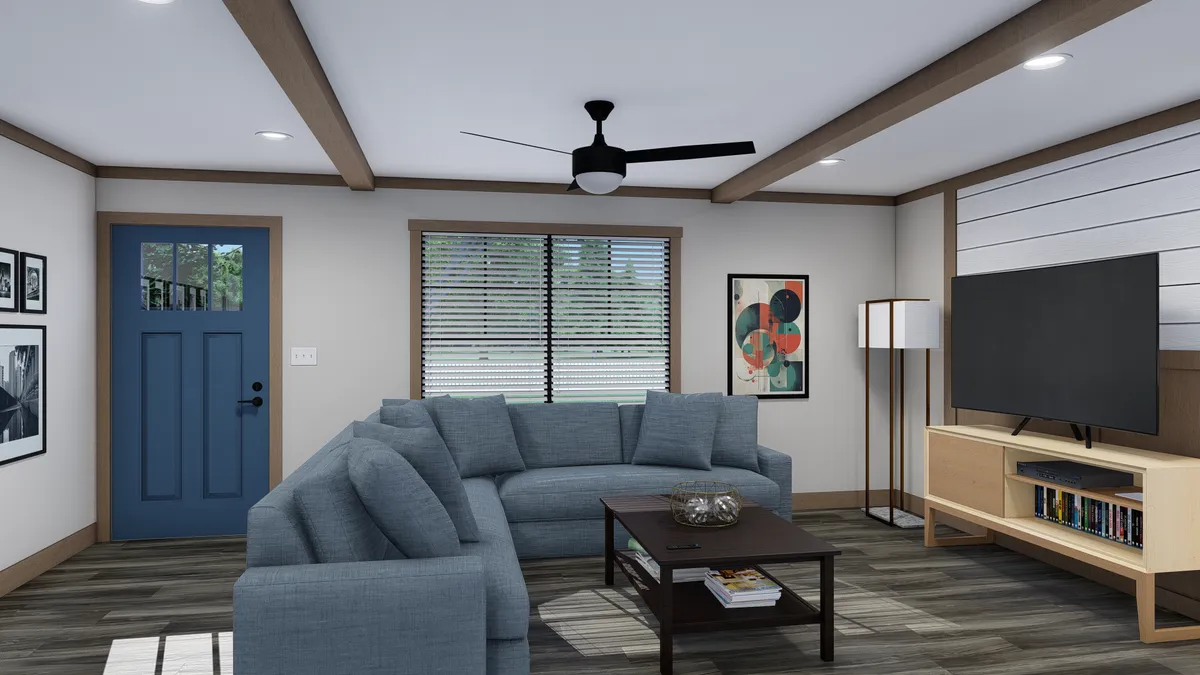 The EMILIE Living Room. This Manufactured Mobile Home features 3 bedrooms and 2 baths.