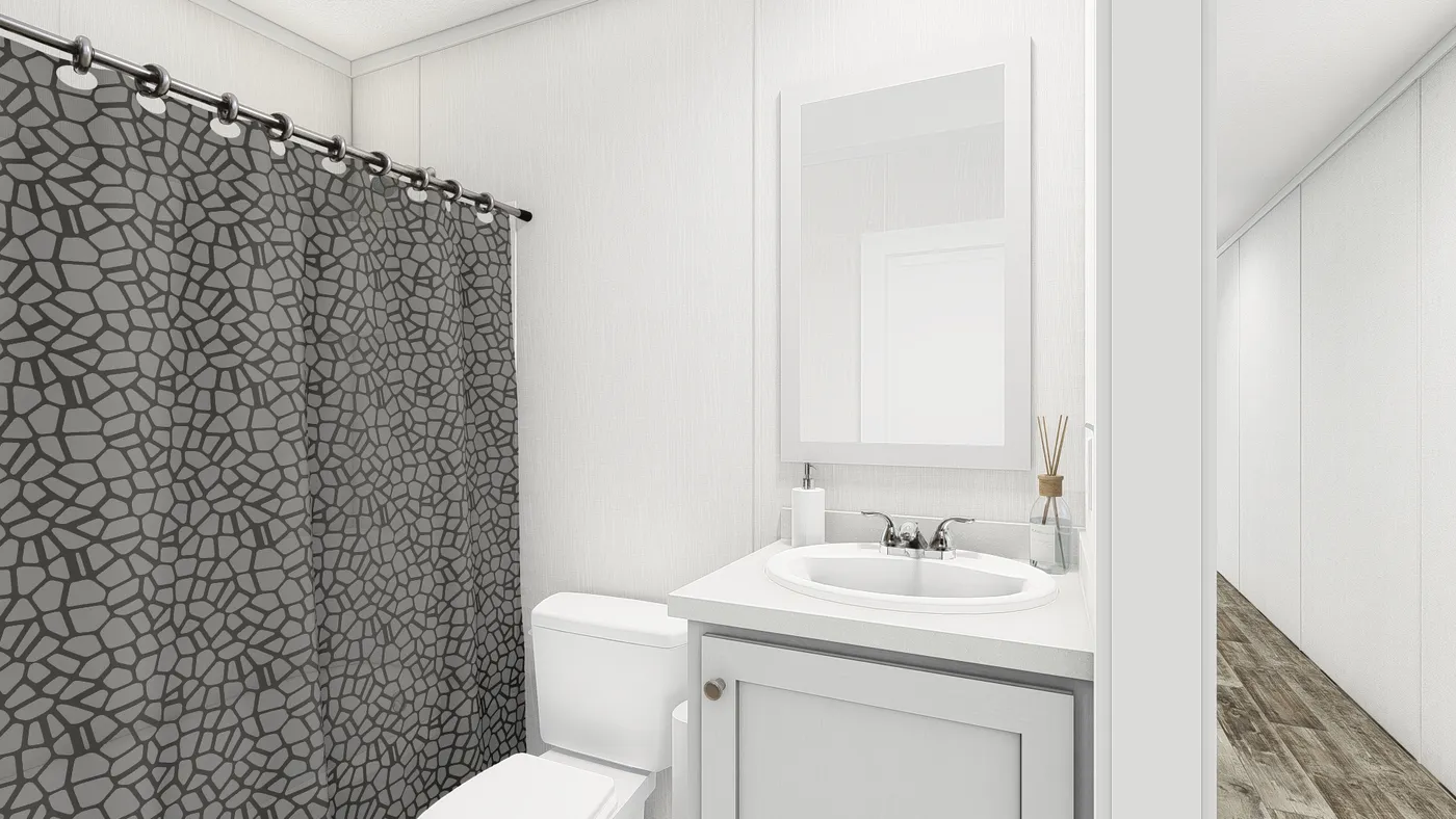 The PERIDOT Guest Bathroom. This Manufactured Mobile Home features 2 bedrooms and 1 bath.