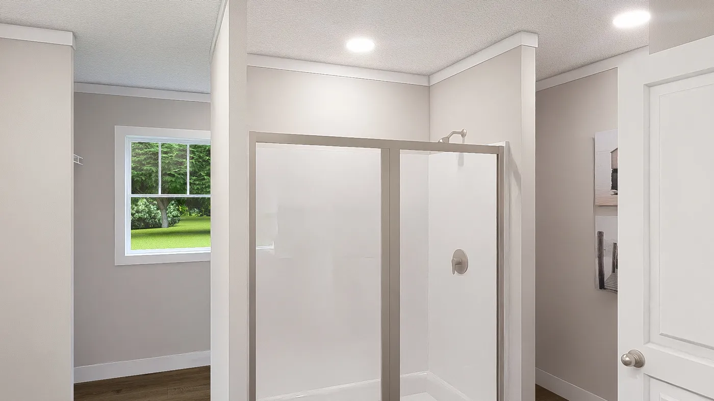 The SHOUT Primary Bathroom. This Manufactured Mobile Home features 3 bedrooms and 2 baths.