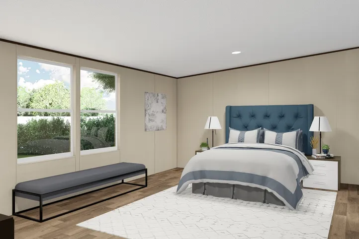 The TRIUMPH Primary Bedroom. This Manufactured Mobile Home features 5 bedrooms and 3 baths.