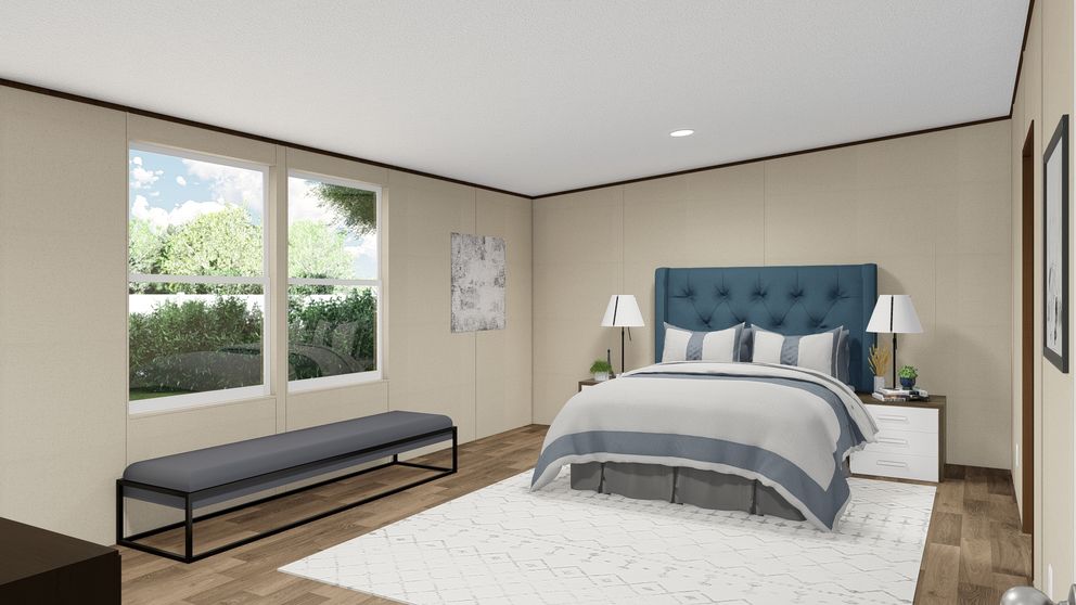 The TRIUMPH Primary Bedroom. This Manufactured Mobile Home features 5 bedrooms and 3 baths.