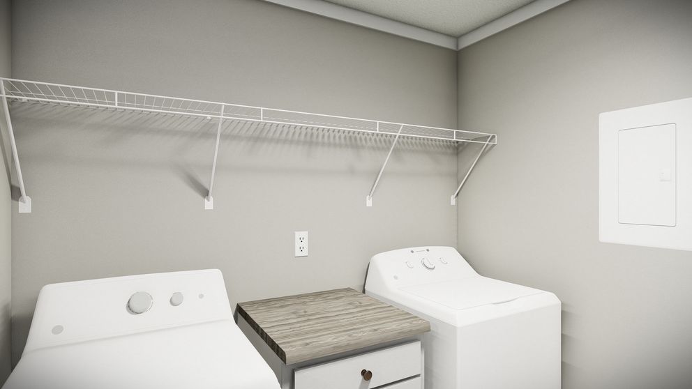 The THE WASHINGTON Utility Room. This Manufactured Mobile Home features 3 bedrooms and 2 baths.