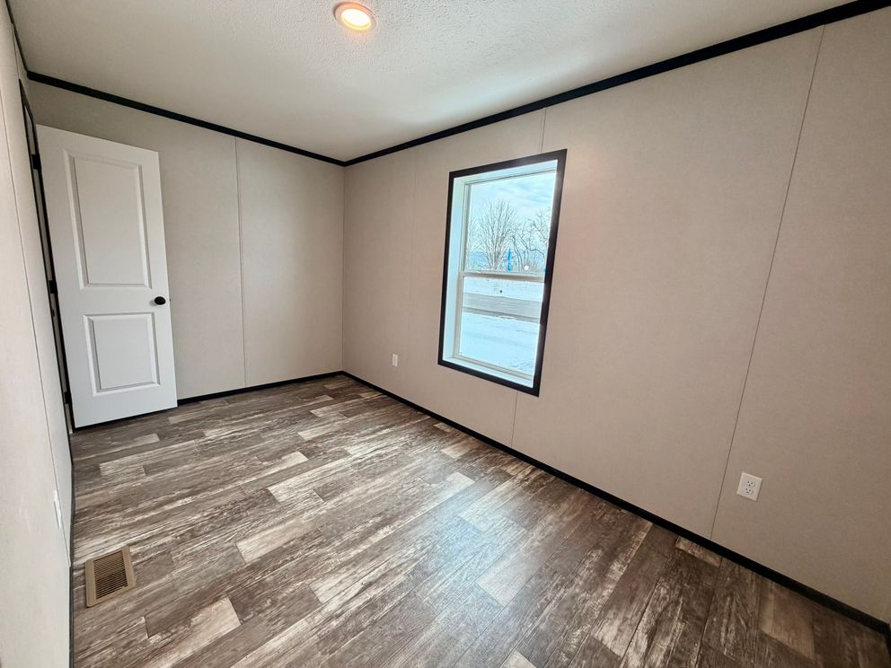 The PEARL Guest Bedroom. This Manufactured Mobile Home features 3 bedrooms and 2 baths.