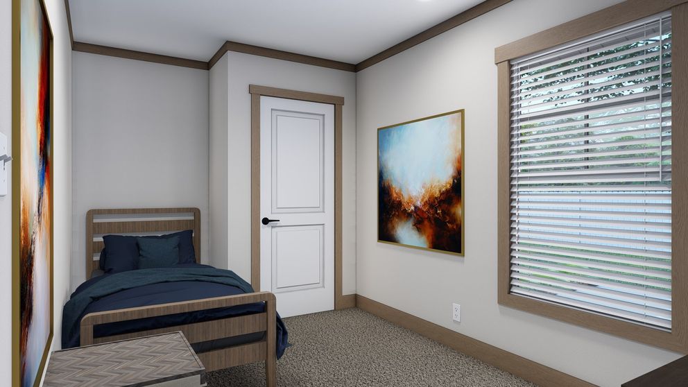 The TRINITY 60 Bedroom. This Manufactured Mobile Home features 2 bedrooms and 2 baths.