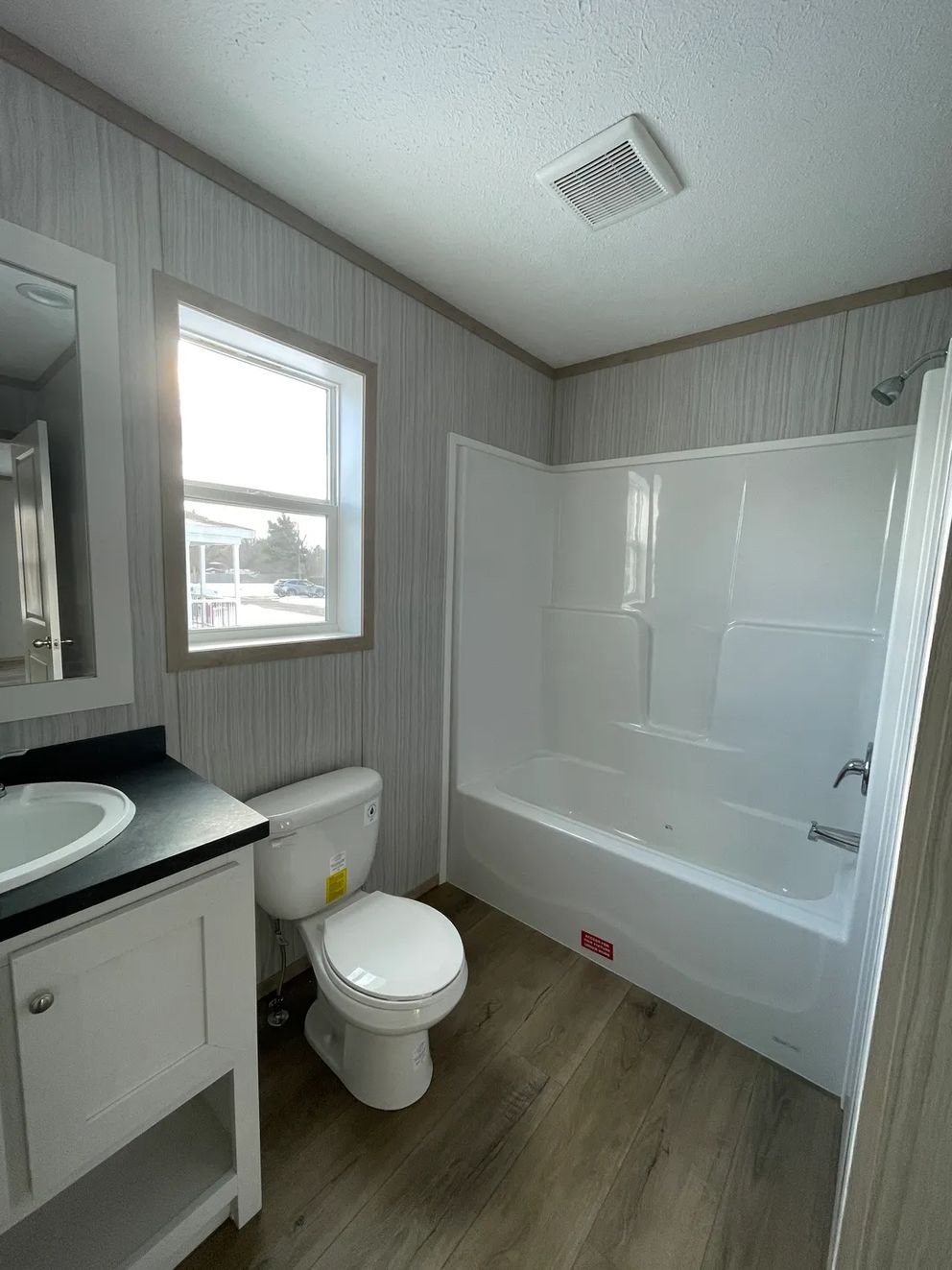 The JADE 48 Guest Bathroom. This Manufactured Mobile Home features 3 bedrooms and 2 baths.