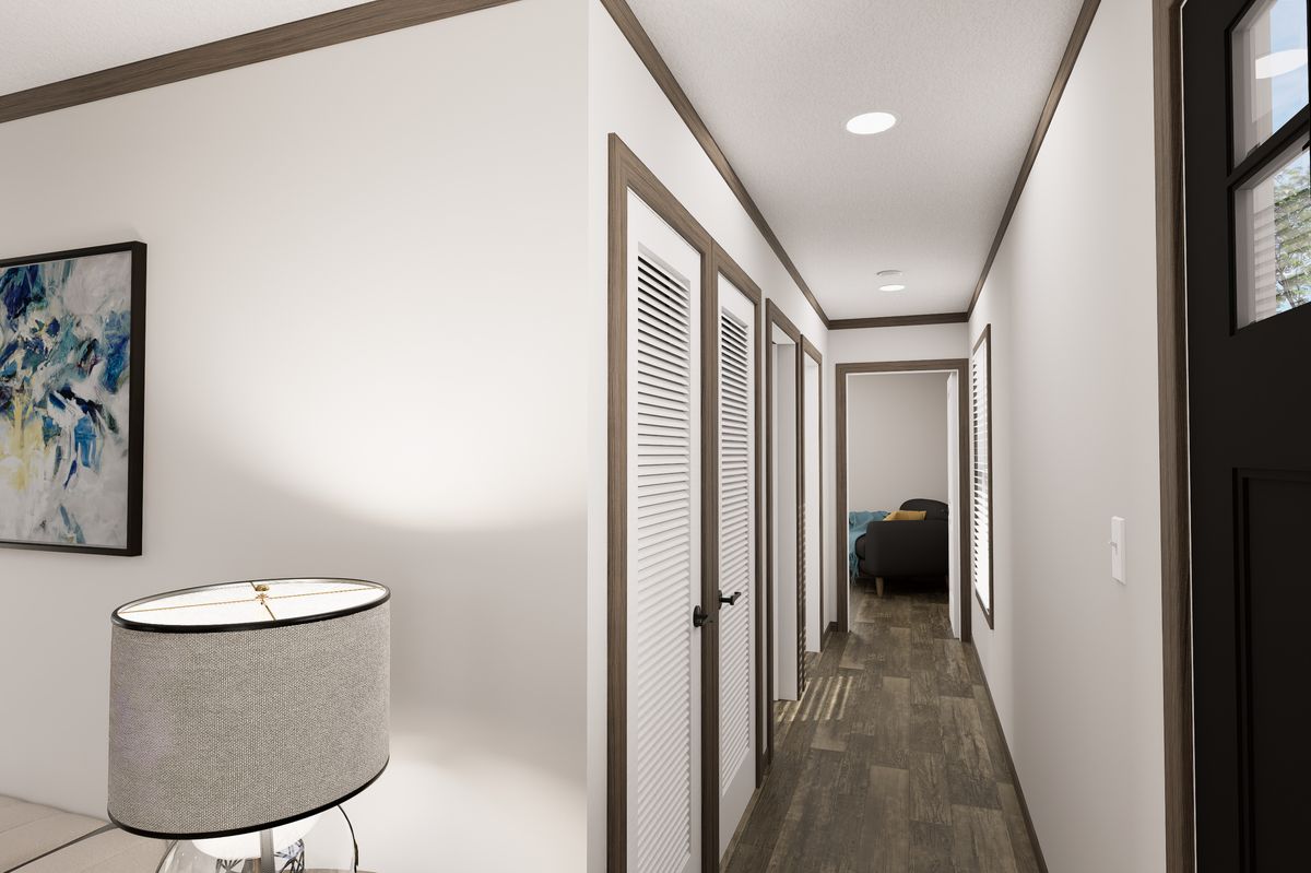 The THE TRUMAN Hallway. This Manufactured Mobile Home features 3 bedrooms and 2 baths.