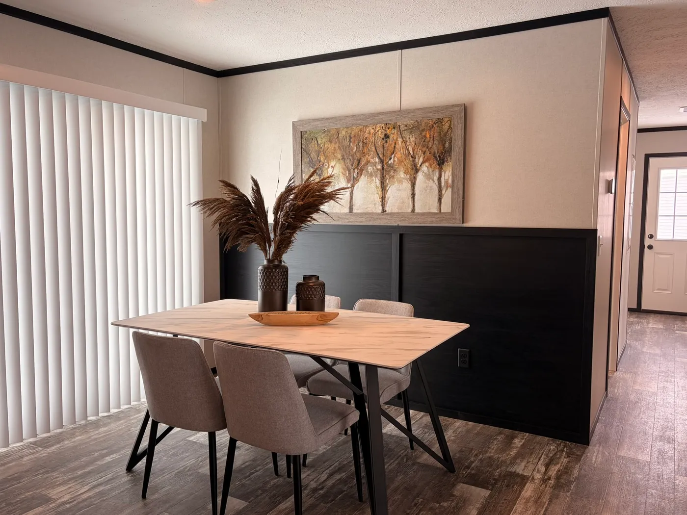 The DIAMOND Dining Area. This Manufactured Mobile Home features 3 bedrooms and 2 baths.