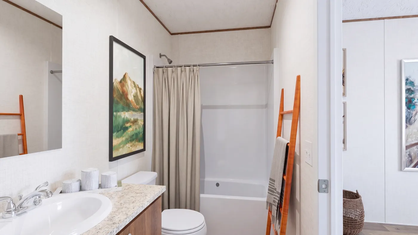 The DOGWOOD Primary Bathroom. This Manufactured Mobile Home features 2 bedrooms and 2 baths.