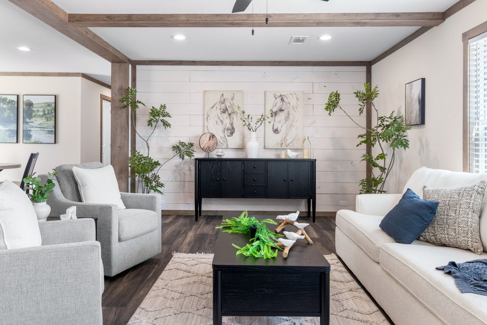 The FARM 4 FLEX Living Room. This Manufactured Mobile Home features 4 bedrooms and 3 baths.