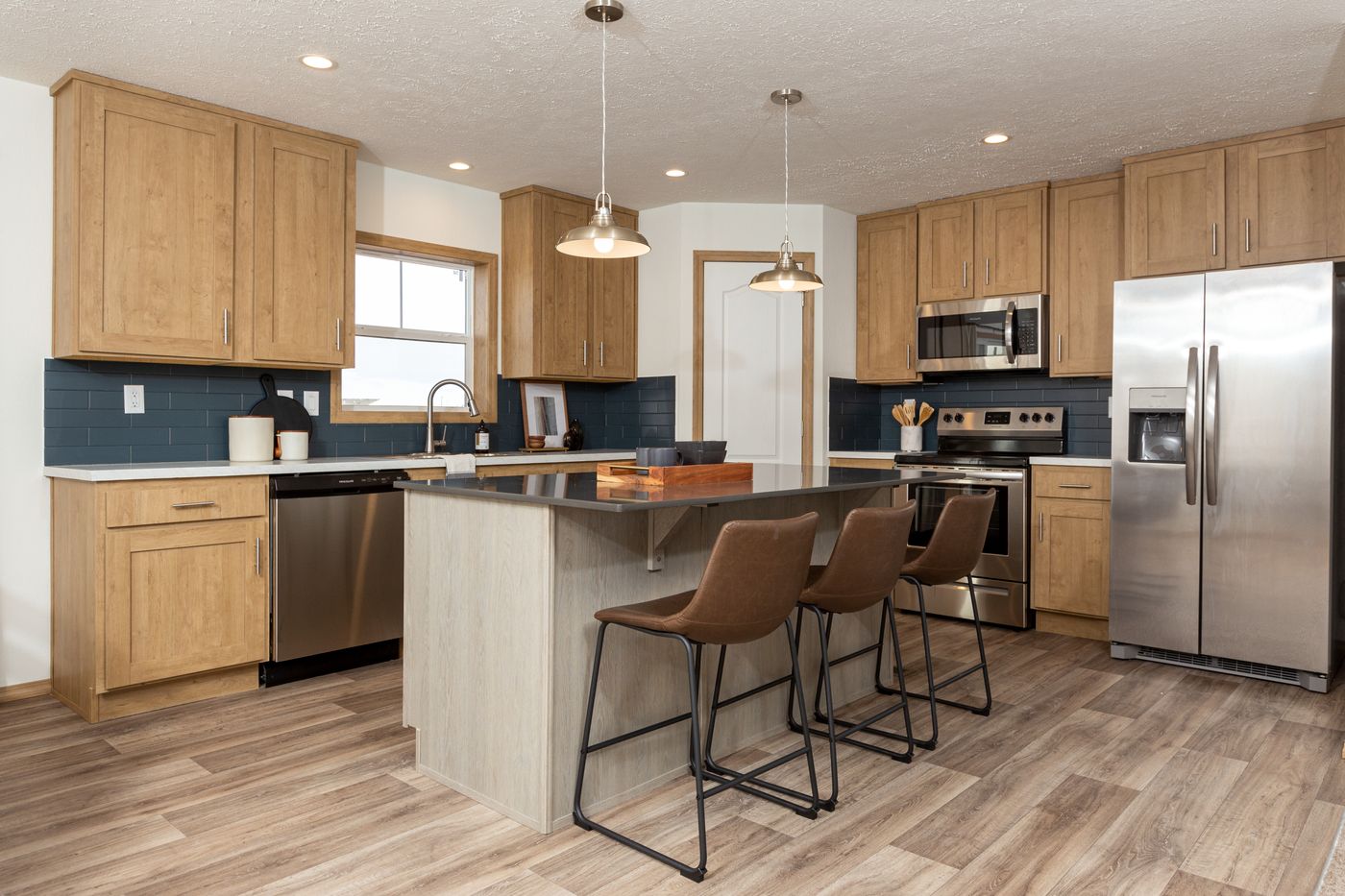 The THE ANTHONY Kitchen. This Manufactured Mobile Home features 2 bedrooms and 2 baths.