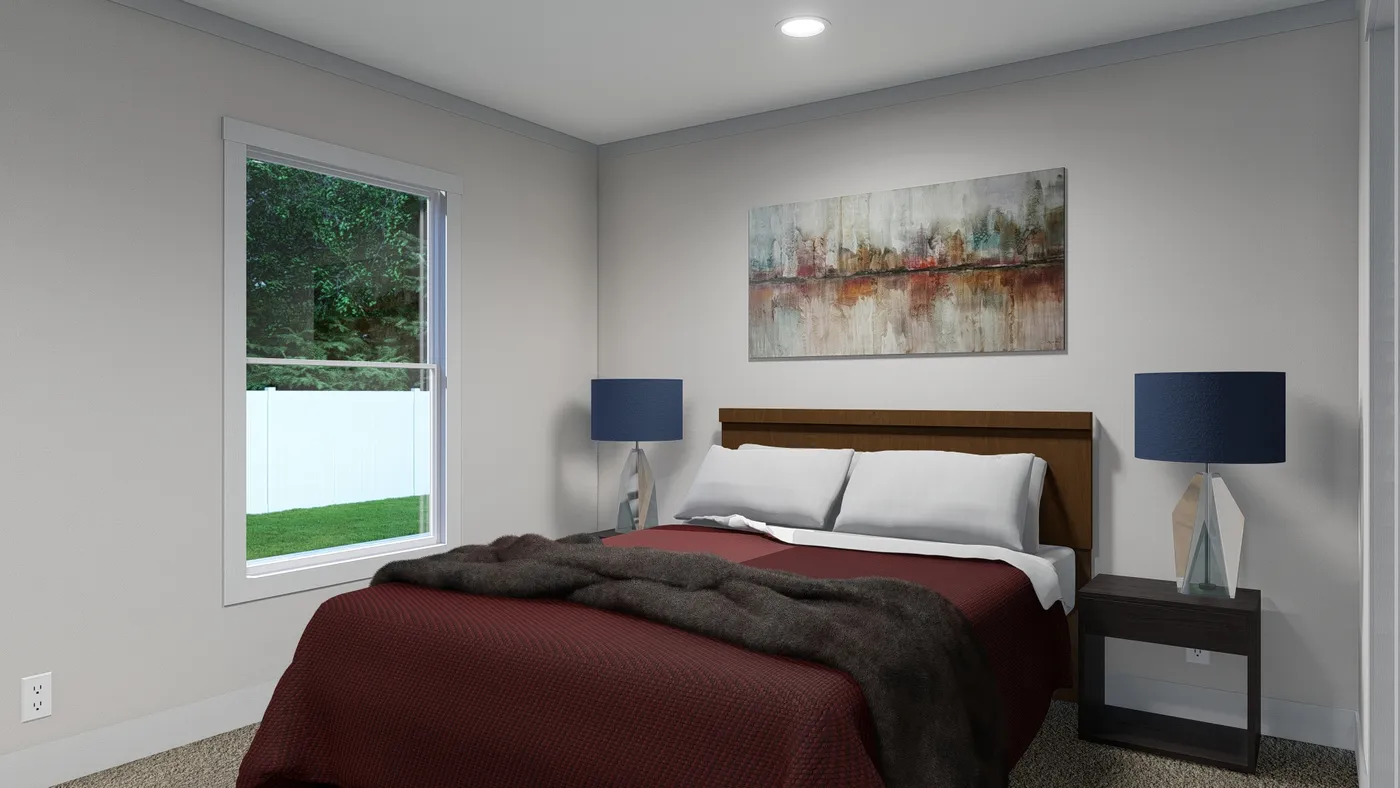 The SWEET DREAMS Primary Bedroom. This Manufactured Mobile Home features 3 bedrooms and 2 baths.