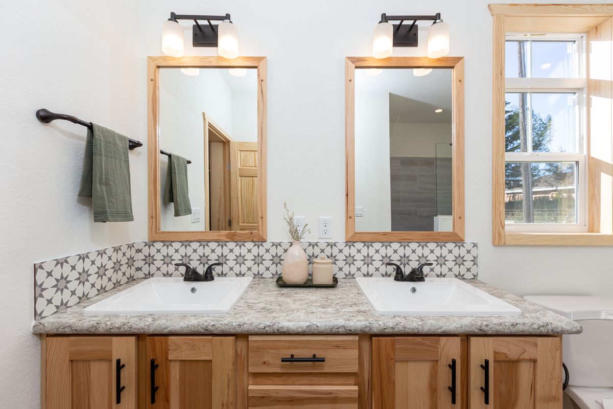The LEGACY 412 Master Bathroom. This Manufactured Mobile Home features 3 bedrooms and 2 baths.