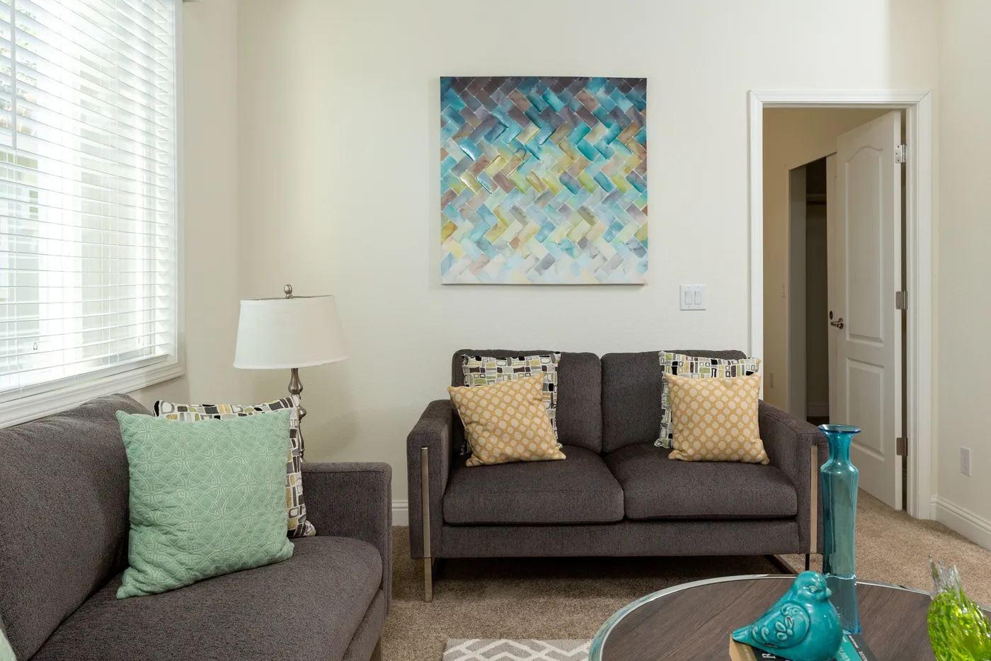 The FAIRPOINT 27543F Living Room. This Manufactured Mobile Home features 3 bedrooms and 2 baths.