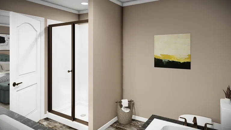 The THE MAVERICK Primary Bathroom. This Manufactured Mobile Home features 3 bedrooms and 2 baths.