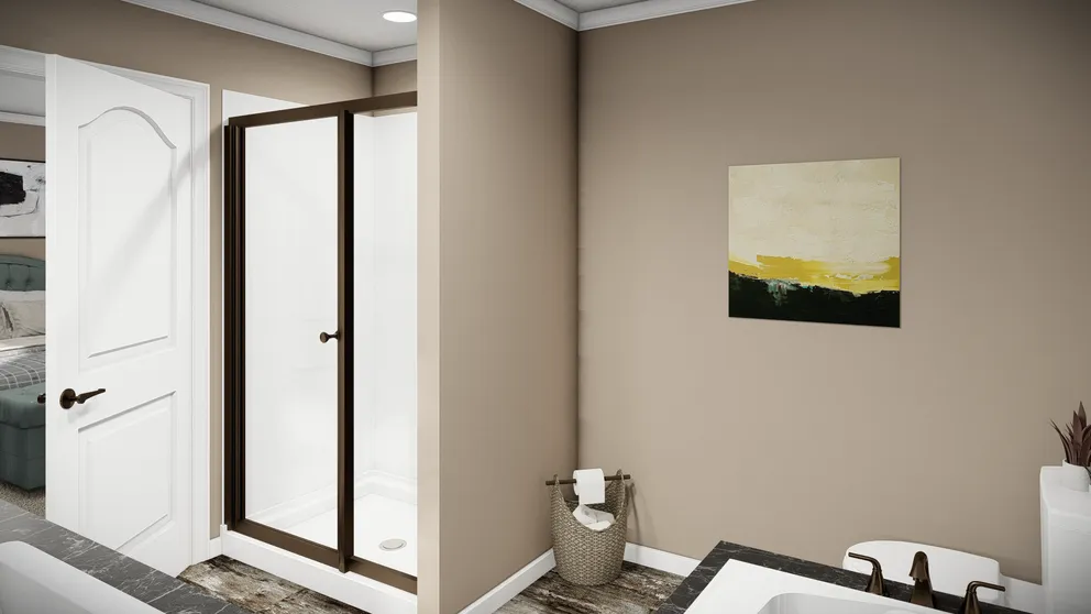 The THE MAVERICK Primary Bathroom. This Manufactured Mobile Home features 3 bedrooms and 2 baths.