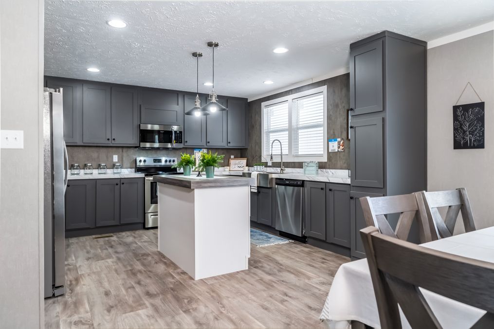 The THE FUSION 32B Kitchen. This Manufactured Mobile Home features 4 bedrooms and 2 baths.
