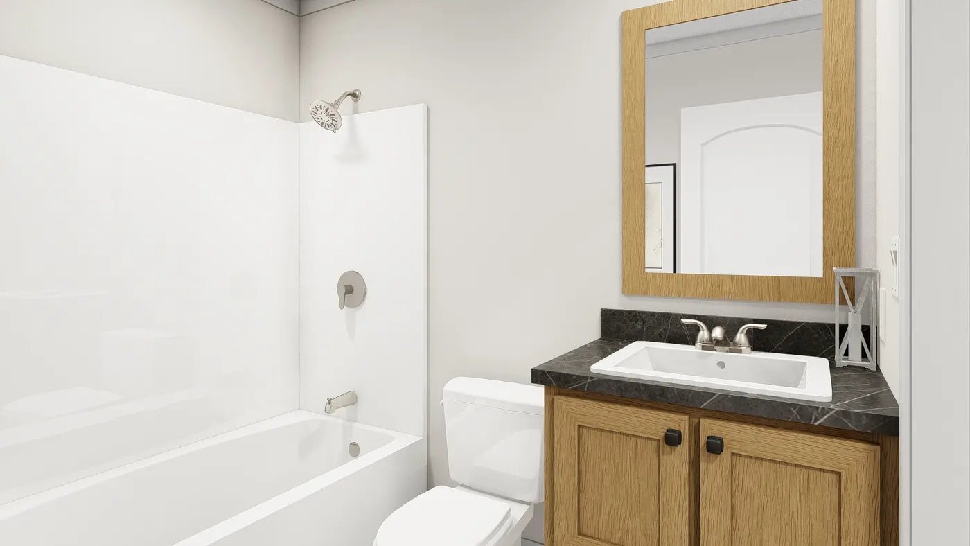 The MOVE ON UP Guest Bathroom. This Manufactured Mobile Home features 3 bedrooms and 2 baths.