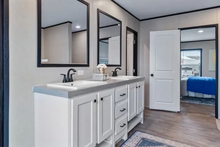 The HERCULES Primary Bathroom. This Manufactured Mobile Home features 4 bedrooms and 2 baths.