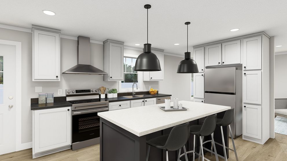 The UNDER PRESSURE Kitchen. This Manufactured Mobile Home features 3 bedrooms and 2 baths.