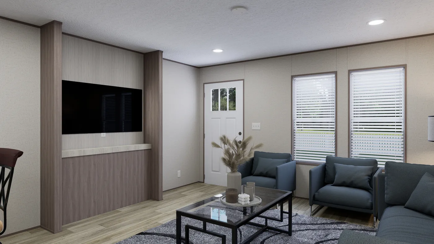 The ROCKY VALLEY Living Room. This Manufactured Mobile Home features 3 bedrooms and 2 baths.