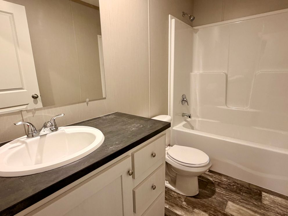 The FRANKLIN Guest Bathroom. This Manufactured Mobile Home features 3 bedrooms and 2 baths.