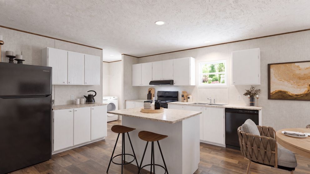 The OAK Kitchen. This Manufactured Mobile Home features 4 bedrooms and 2 baths.