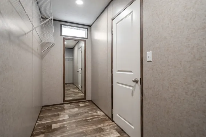 The LOCKLEAR Exterior. This Manufactured Mobile Home features 4 bedrooms and 2 baths.