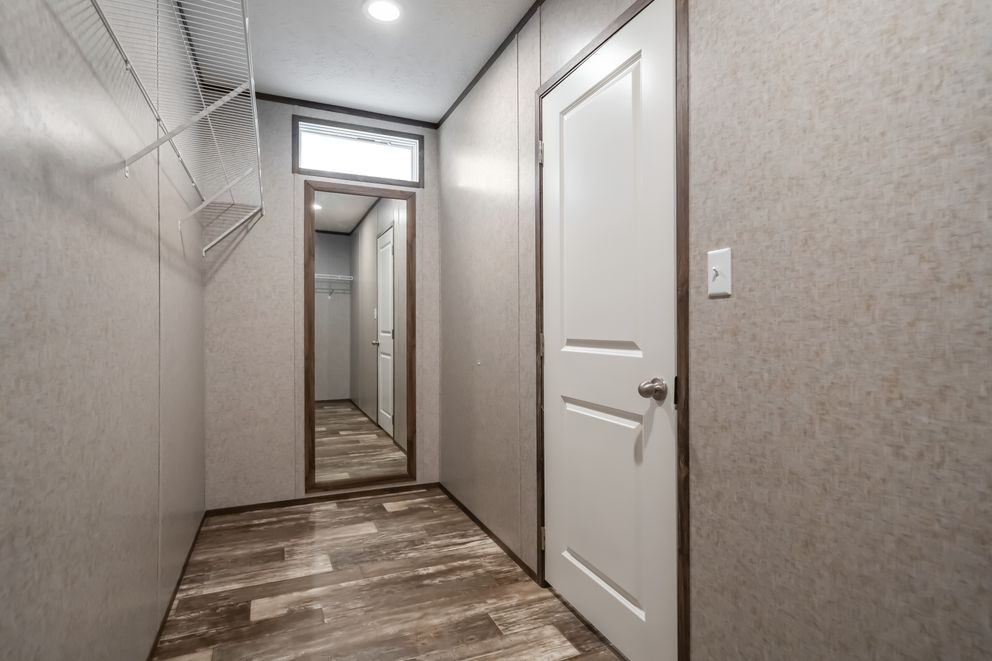 The LOCKLEAR Exterior. This Manufactured Mobile Home features 4 bedrooms and 2 baths.
