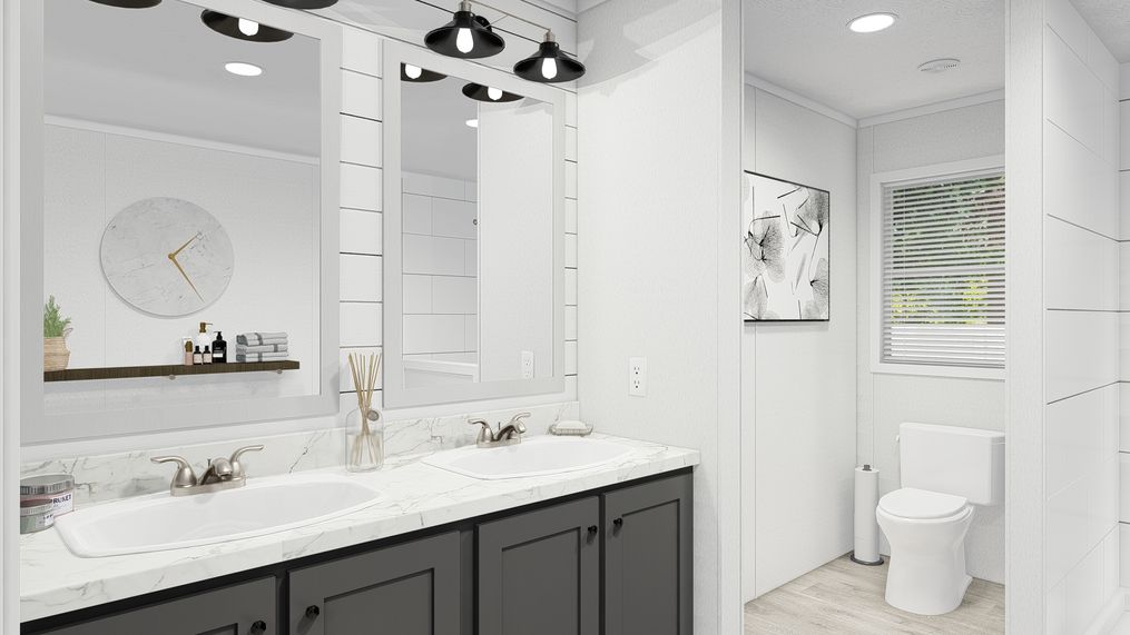 The THE RESERVE 52 Primary Bathroom. This Manufactured Mobile Home features 3 bedrooms and 2 baths.