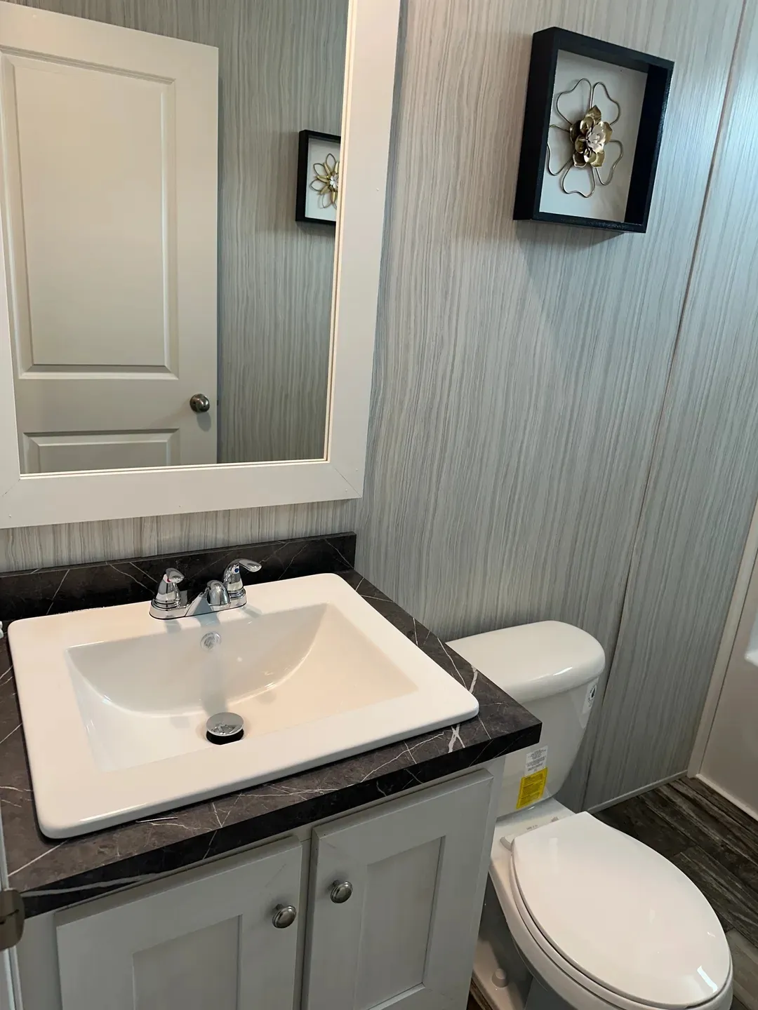 The TOPAZ Guest Bathroom. This Manufactured Mobile Home features 3 bedrooms and 2 baths.