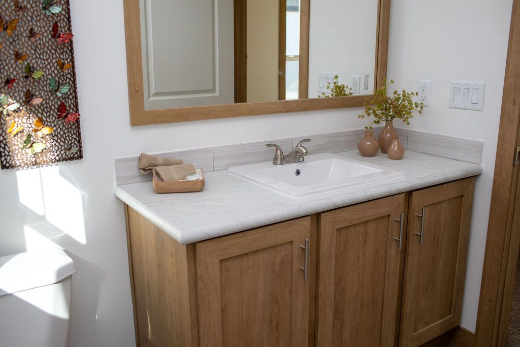 The RAMSEY 223 Guest Bathroom. This Manufactured Mobile Home features 3 bedrooms and 2 baths.