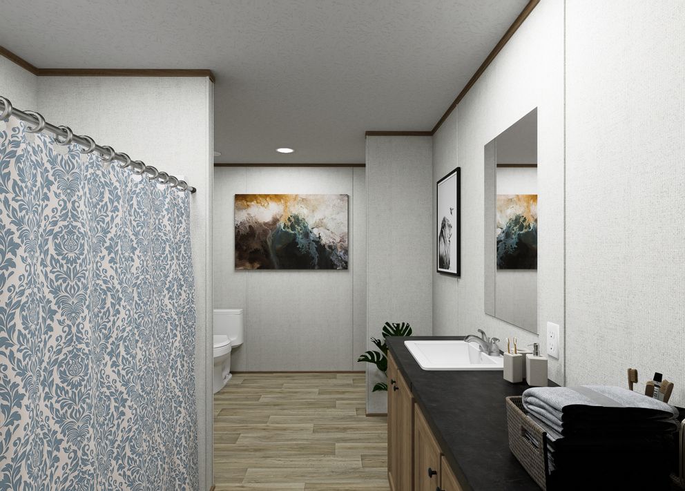 The VISTA Primary Bathroom. This Manufactured Mobile Home features 3 bedrooms and 2 baths.