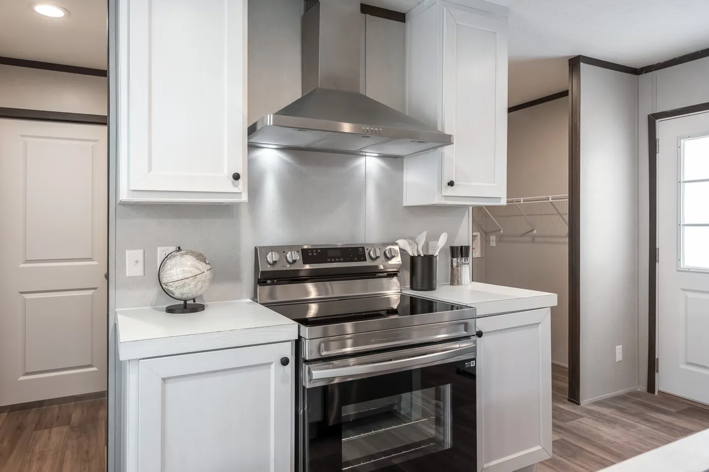 The ESSENCE Kitchen. This Manufactured Mobile Home features 3 bedrooms and 2 baths.