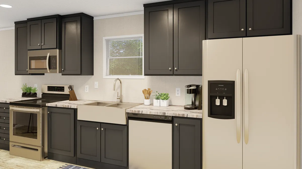 The GRAND LIVING 76B Kitchen. This Manufactured Mobile Home features 3 bedrooms and 2 baths.