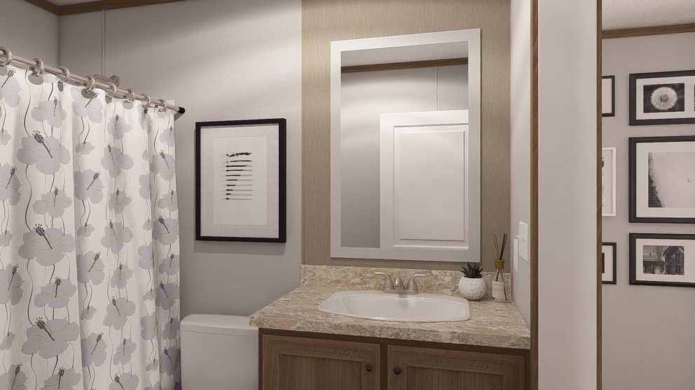 The THE RESERVE 52 Guest Bathroom. This Manufactured Mobile Home features 3 bedrooms and 2 baths.