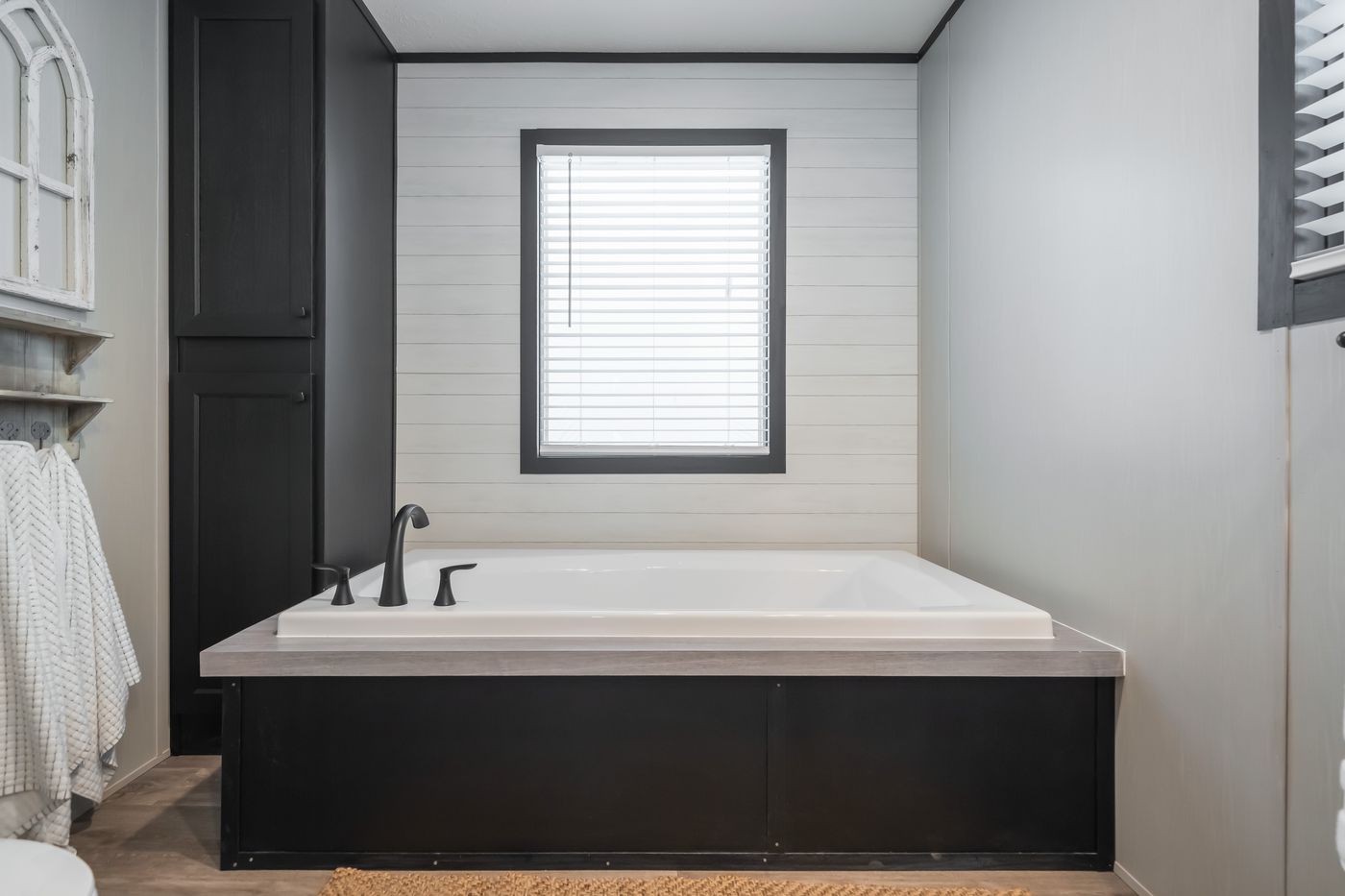 The CRAZY EIGHTS Primary Bathroom. This Manufactured Mobile Home features 4 bedrooms and 2 baths.