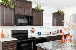 The 3321 CLASSIC Kitchen. This Modular Home features 4 bedrooms and 2 baths.