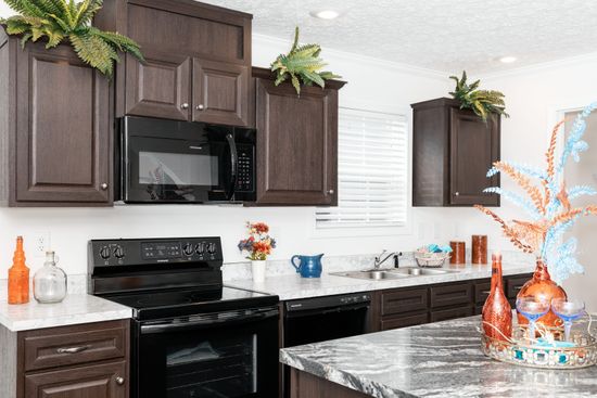 The 3321 CLASSIC Kitchen. This Modular Home features 4 bedrooms and 2 baths.