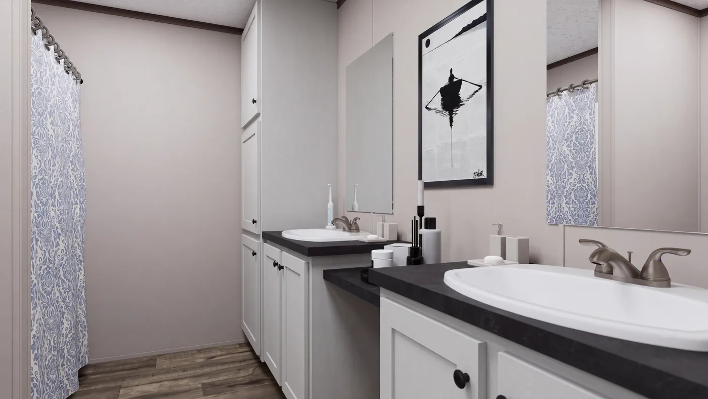The MOUNTAIN BREEZE 3260 Guest Bathroom. This Manufactured Mobile Home features 3 bedrooms and 2 baths.