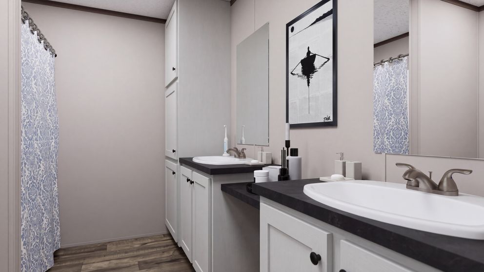 The MOUNTAIN BREEZE 3260 Guest Bathroom. This Manufactured Mobile Home features 3 bedrooms and 2 baths.