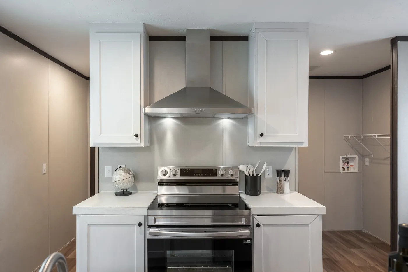 The ESSENCE Kitchen. This Manufactured Mobile Home features 3 bedrooms and 2 baths.